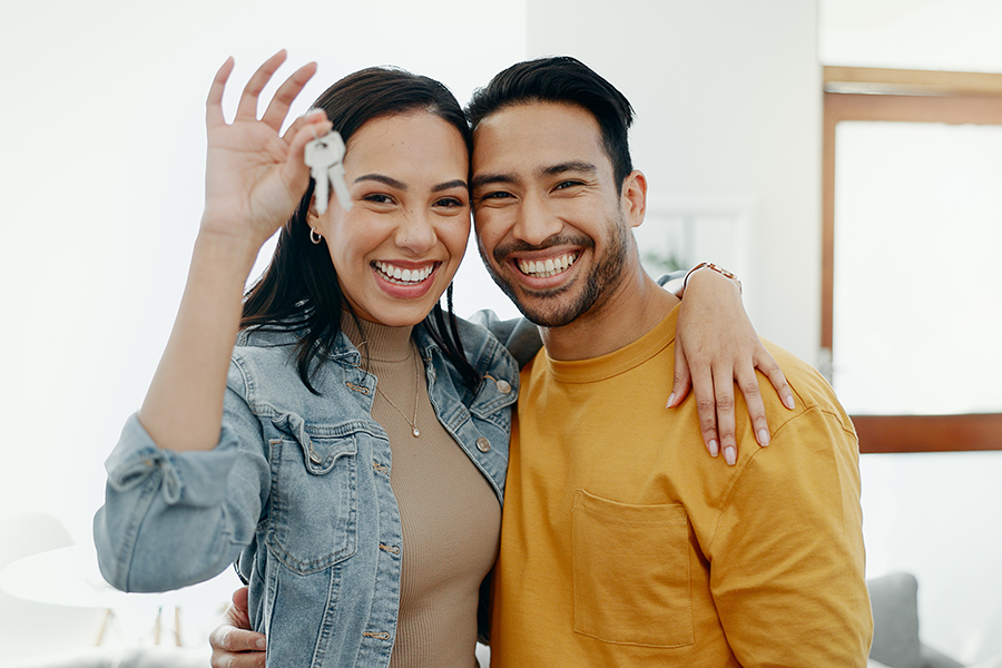 couple with new home keys